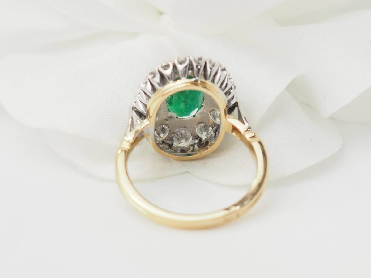 Bague entourage en or bicolore, émeraude et diamants - Castafiore