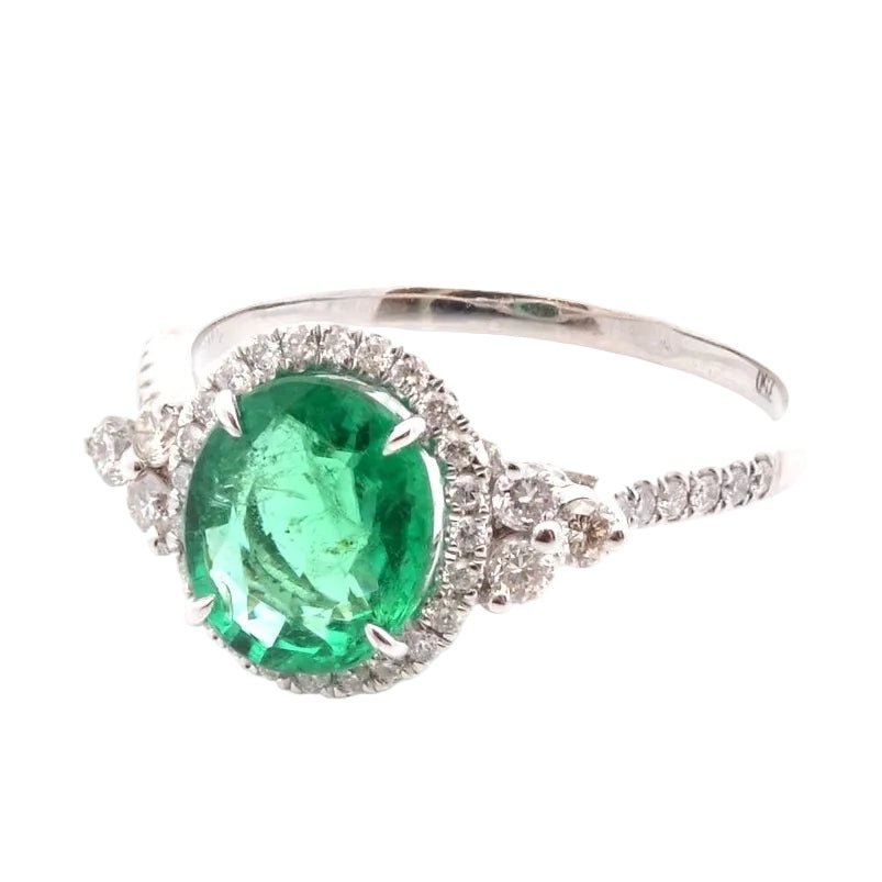 Bague Entourage en or blanc, émeraude et diamants - Castafiore