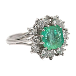 Bague Entourage en or blanc, émeraude et diamants - Castafiore