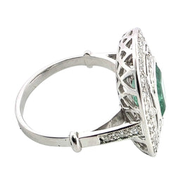 Bague Entourage en or blanc, émeraude et diamants - Castafiore