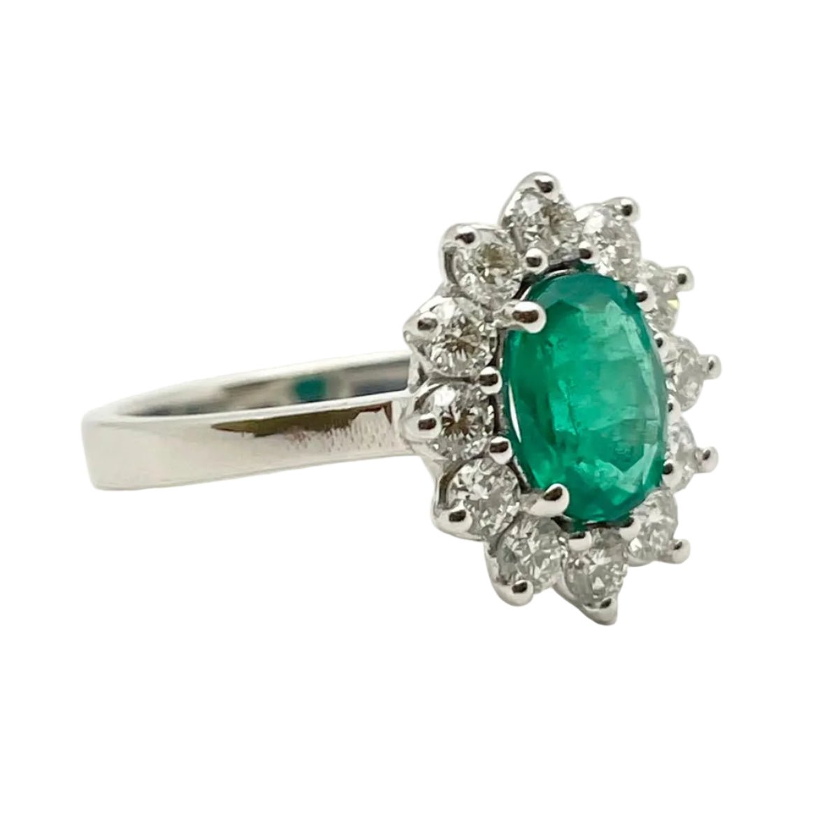 Bague Entourage en or blanc, émeraude et diamants - Castafiore