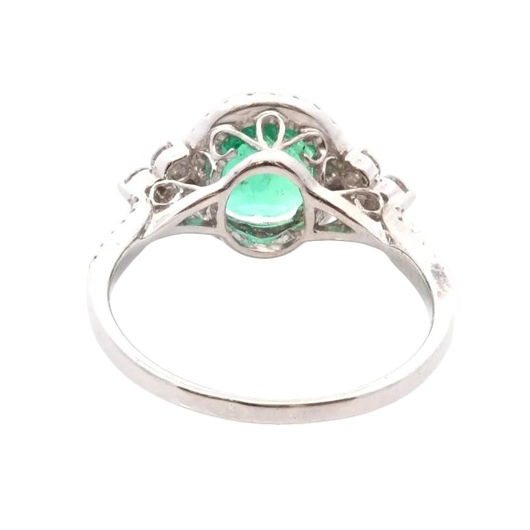 Bague Entourage en or blanc, émeraude et diamants - Castafiore