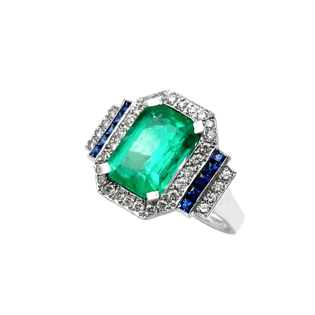 Bague Entourage en or blanc, émeraude, saphirs et diamants - Castafiore