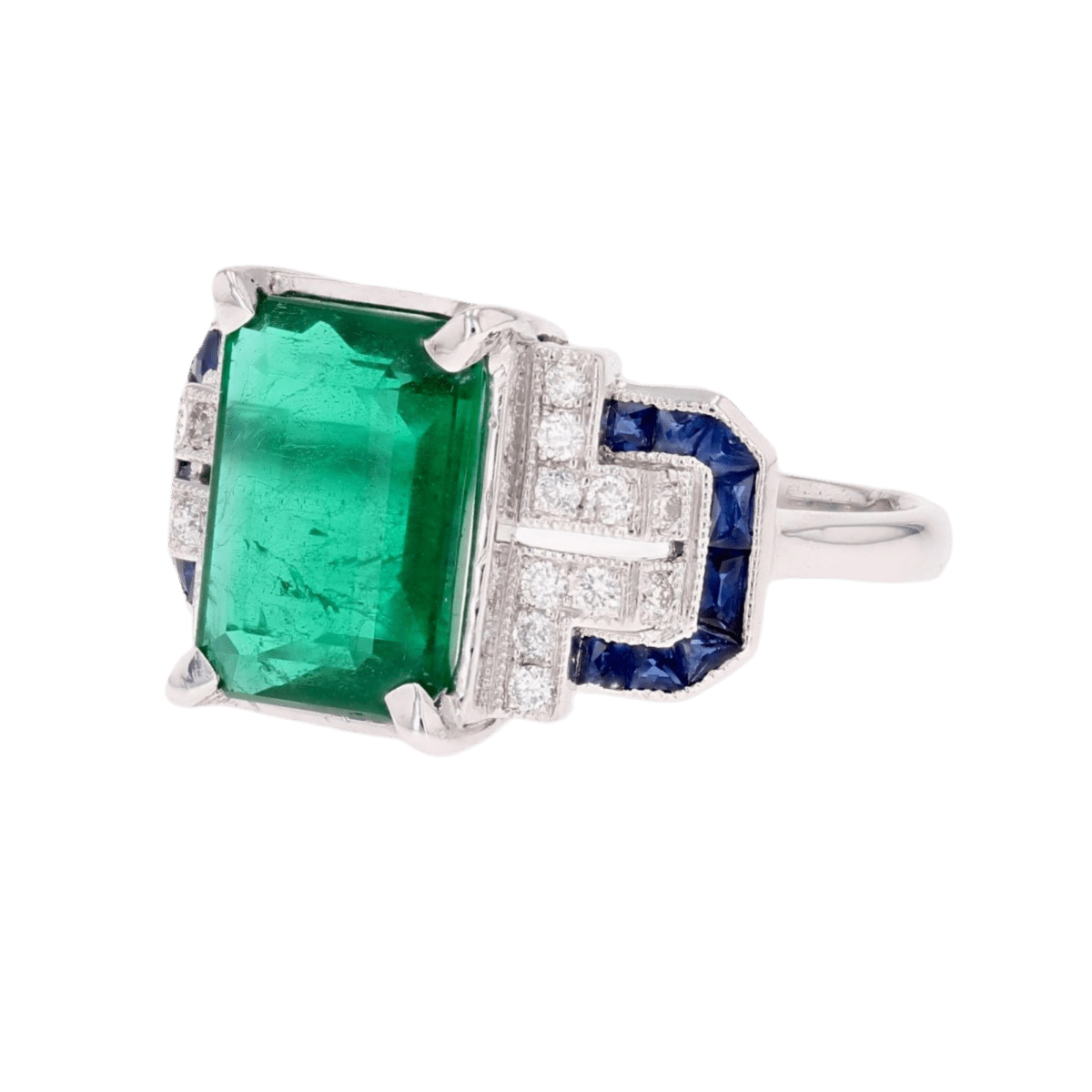 Bague Entourage en or blanc, émeraude, saphirs et diamants - Castafiore