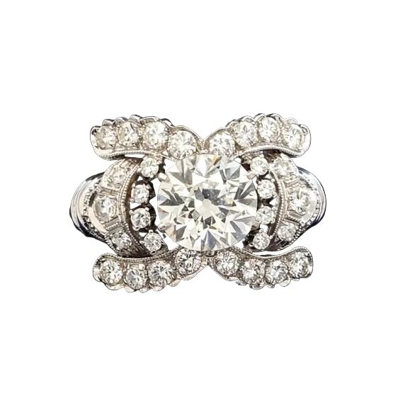 Bague Entourage en or blanc et diamants - Castafiore