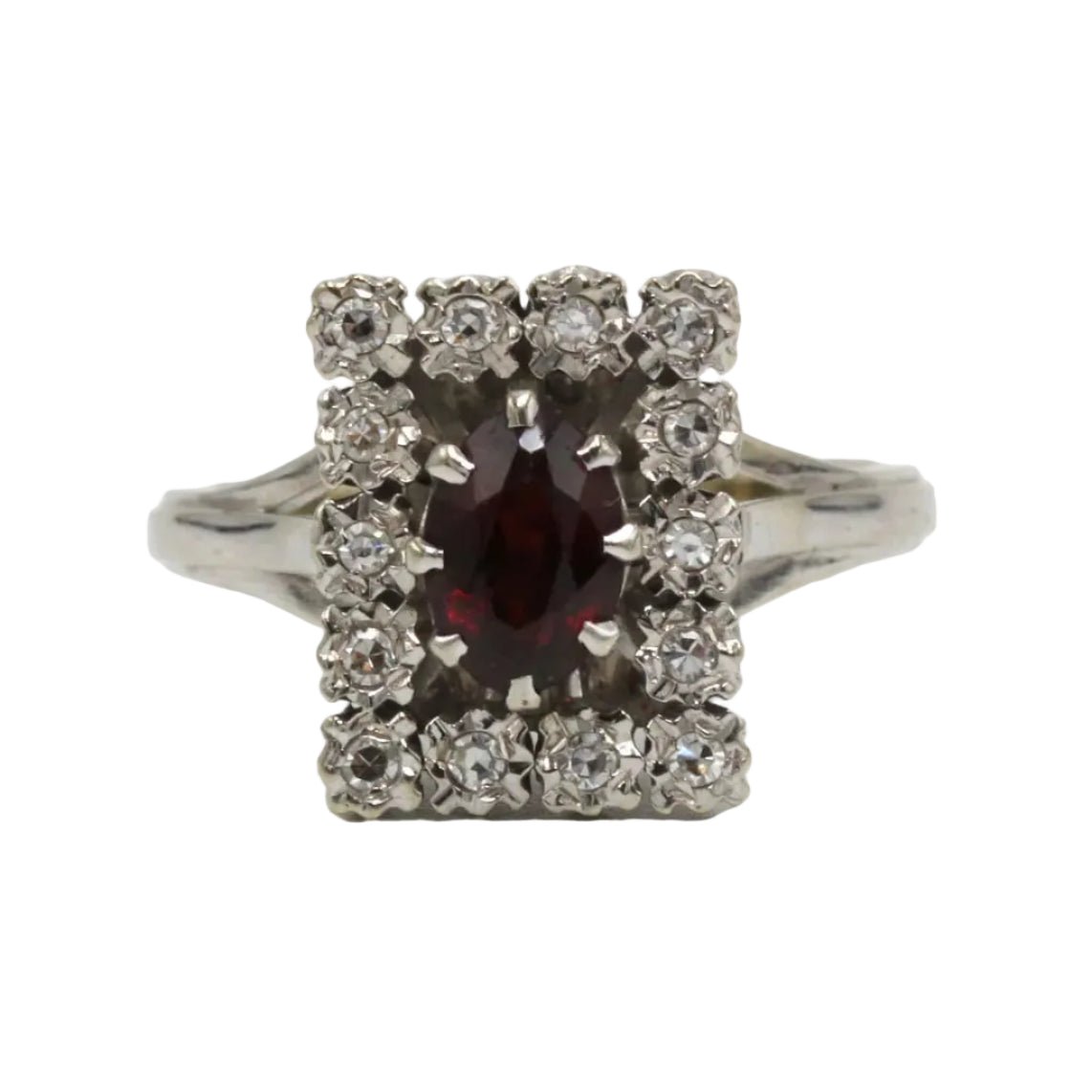 Bague Entourage en or blanc, grenat et diamants - Castafiore