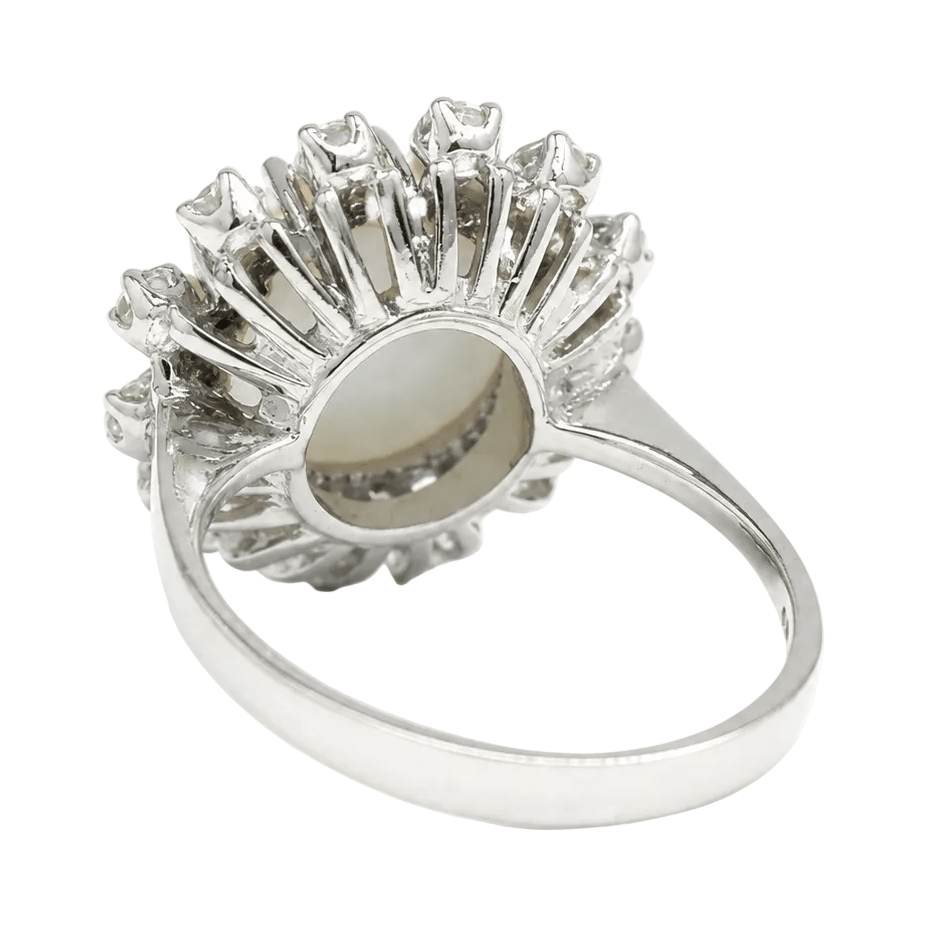 Bague Entourage en or blanc, opale et diamants - Castafiore