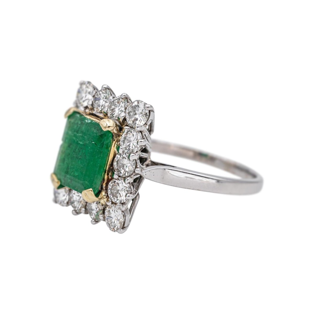 Bague Entourage en or blanc, or jaune, émeraude et diamants - Castafiore