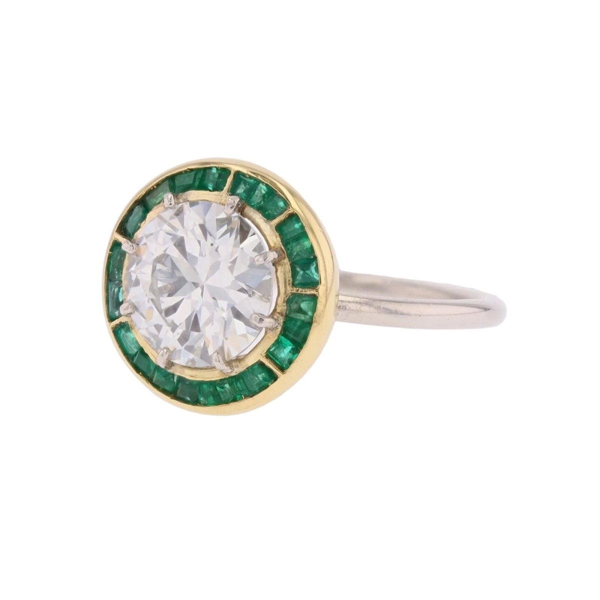 Bague Entourage en or blanc, or jaune, émeraudes et diamants - Castafiore