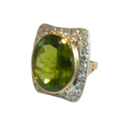 Bague Entourage en or blanc, or jaune, péridot et diamants - Castafiore