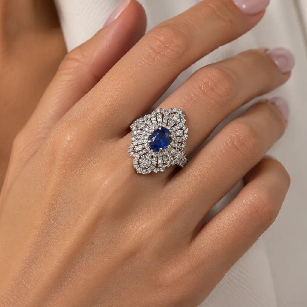 Bague Entourage en or blanc, tanzanite et diamants - Castafiore