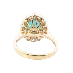 Bague Entourage en or jaune, émeraude et diamants - Castafiore
