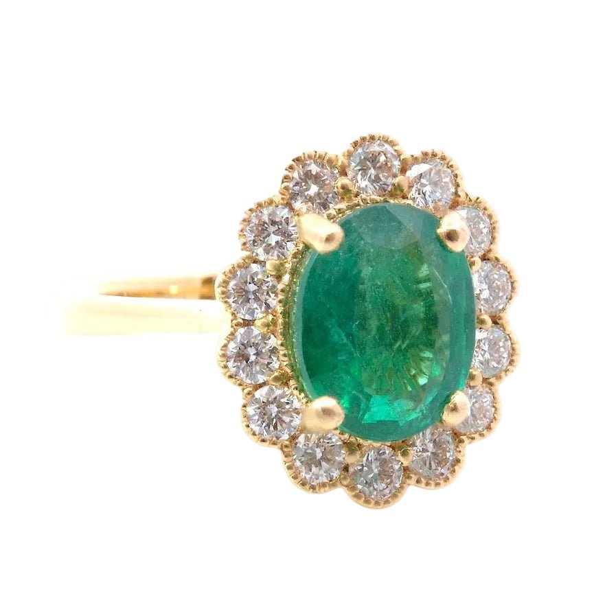 Bague Entourage en or jaune, émeraude et diamants - Castafiore