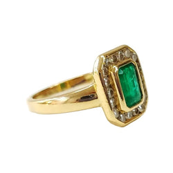 Bague Entourage en or jaune, émeraude et diamants - Castafiore
