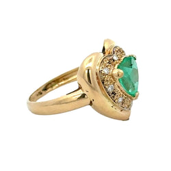 Bague Entourage en or jaune, émeraude et diamants - Castafiore