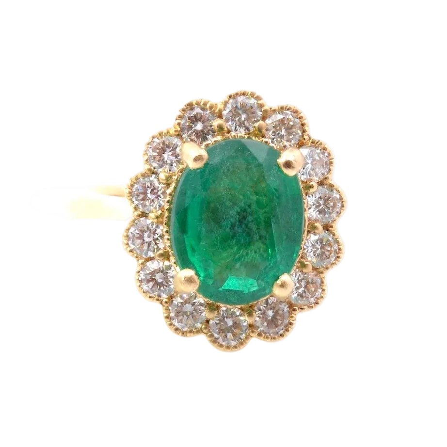 Bague Entourage en or jaune, émeraude et diamants - Castafiore