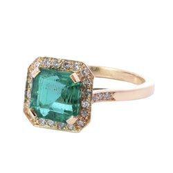 Bague Entourage en or jaune, émeraude et diamants - Castafiore