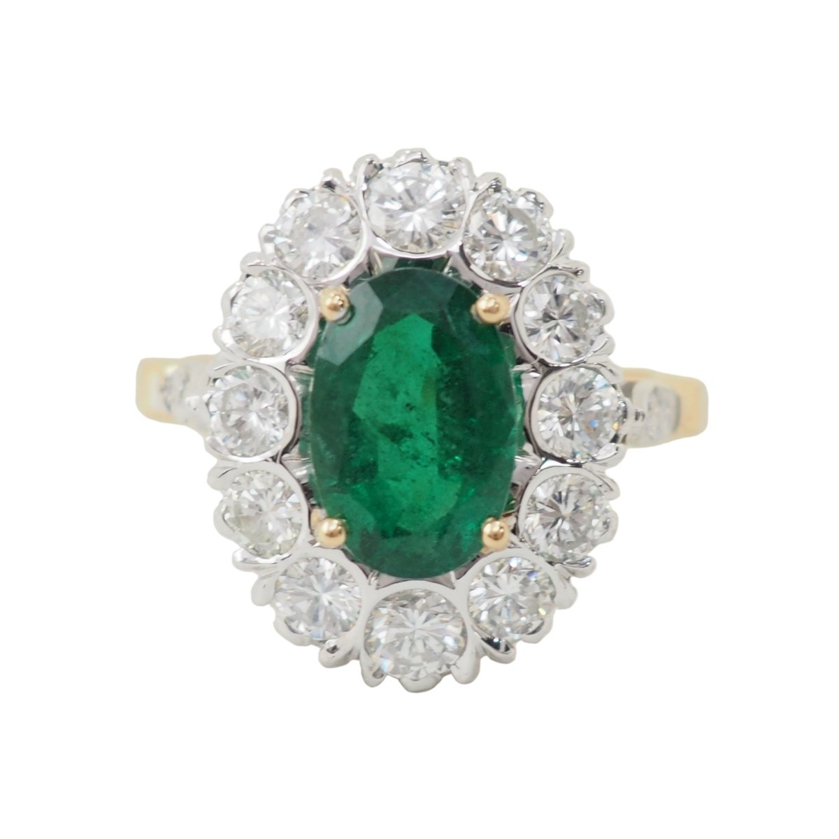 Bague Entourage en or jaune, or blanc, émeraude et diamants - Castafiore