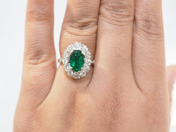 Bague Entourage en or jaune, or blanc, émeraude et diamants - Castafiore