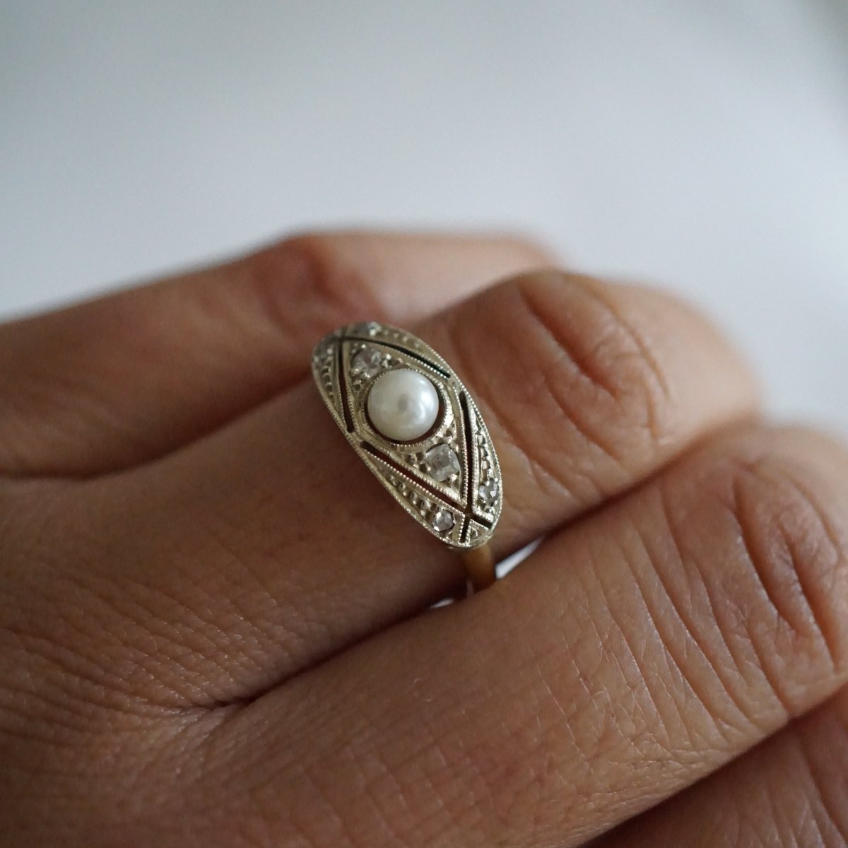 Bague Entourage en or jaune, or blanc, perle et diamants - Castafiore