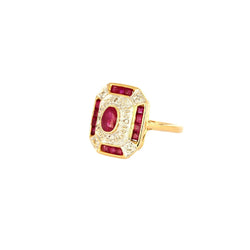 Bague Entourage en or jaune, or blanc, rubis, et diamants - Castafiore