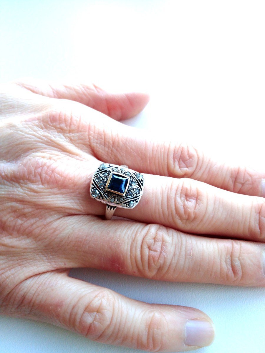 Bague Entourage en or jaune, or blanc, saphir, et diamants - Castafiore