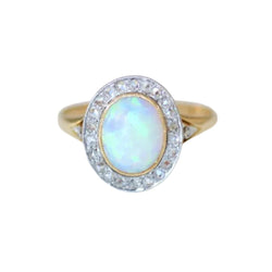 Bague Entourage en or jaune, platine, opale et diamants - Castafiore