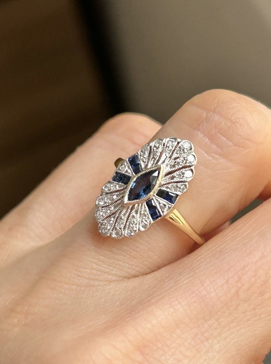 Bague Entourage en or jaune, platine, saphir et diamants - Castafiore