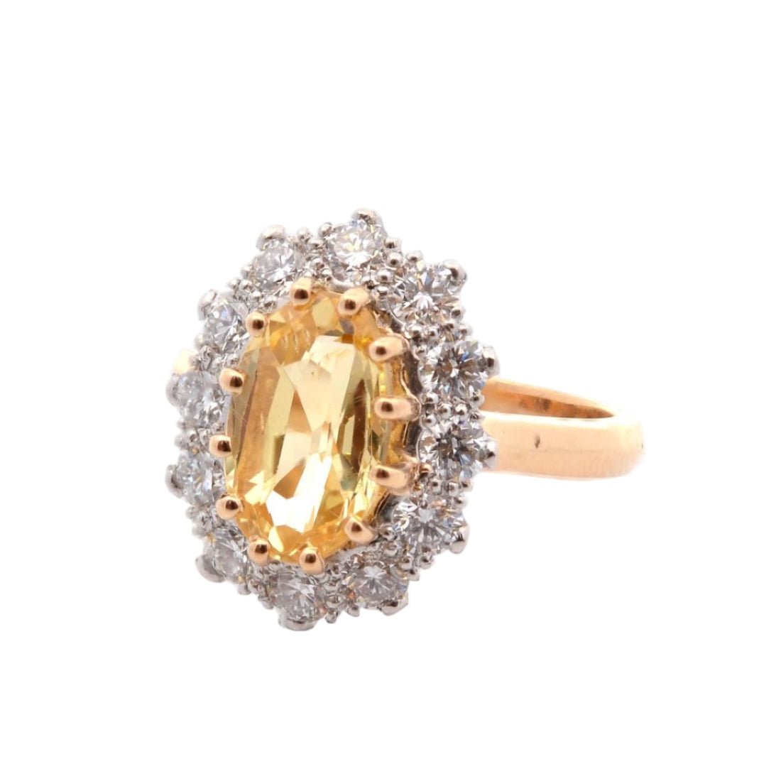Bague Entourage en or jaune, platine, saphir, et diamants - Castafiore