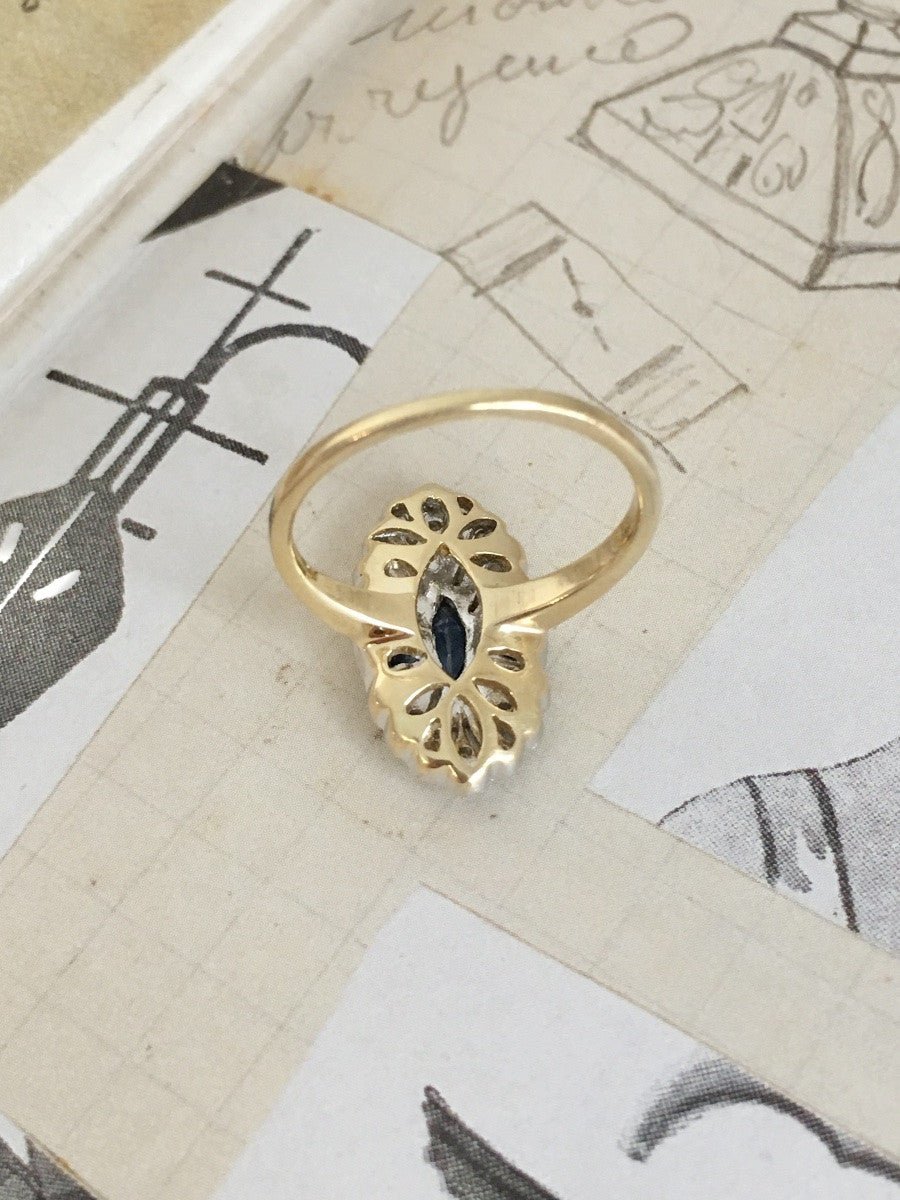 Bague Entourage en or jaune, platine, saphir et diamants - Castafiore