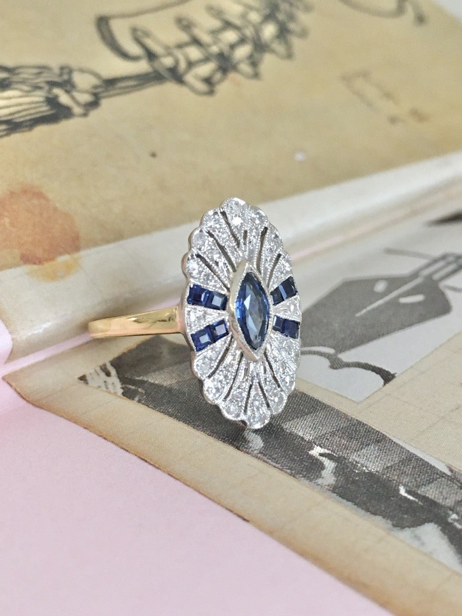 Bague Entourage en or jaune, platine, saphir et diamants - Castafiore