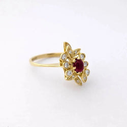 Bague Entourage en or jaune, rubis et diamants - Castafiore