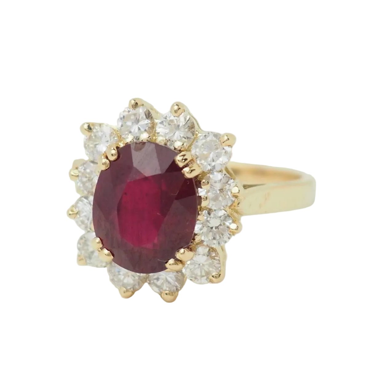 Bague Entourage en or jaune, rubis et diamants - Castafiore