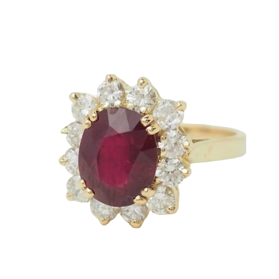 Bague entourage en or jaune rubis et diamants - Castafiore