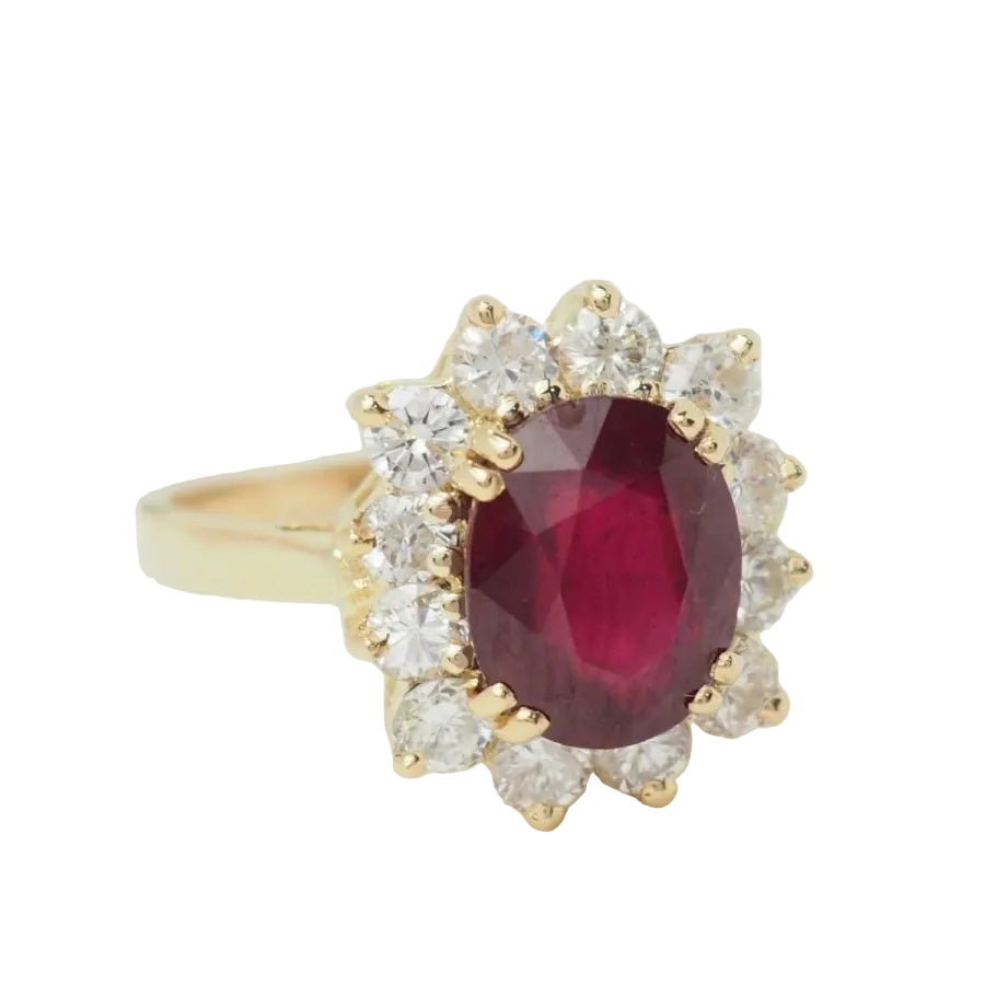 Bague entourage en or jaune rubis et diamants - Castafiore