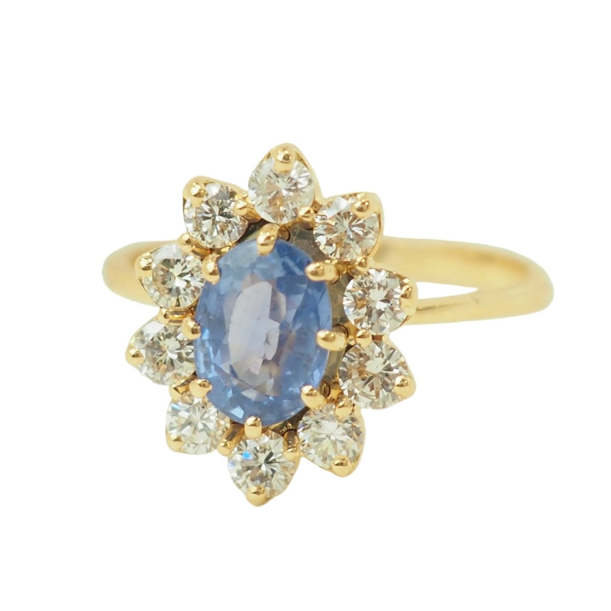 Bague Entourage en or jaune, saphir et diamants - Castafiore