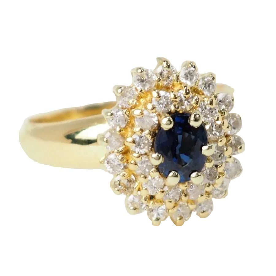 Bague Entourage en or jaune, saphir, et diamants - Castafiore
