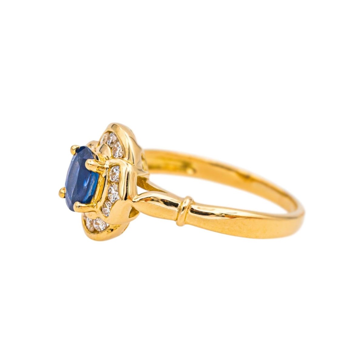 Bague Entourage en or jaune, saphir et diamants - Castafiore