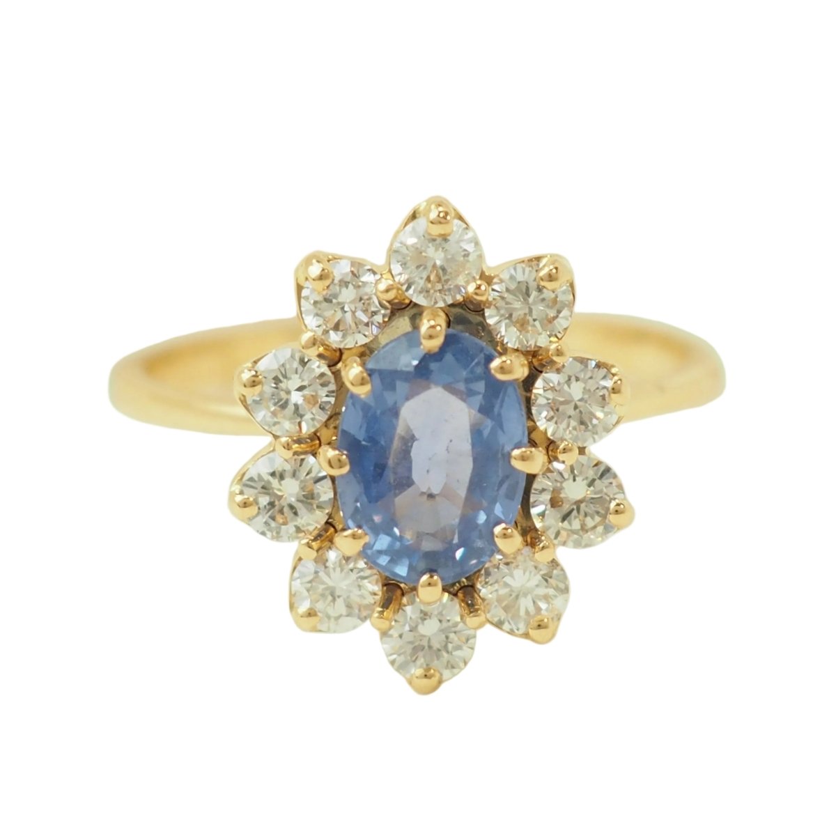 Bague Entourage en or jaune, saphir et diamants - Castafiore
