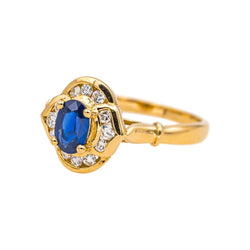 Bague Entourage en or jaune, saphir et diamants - Castafiore