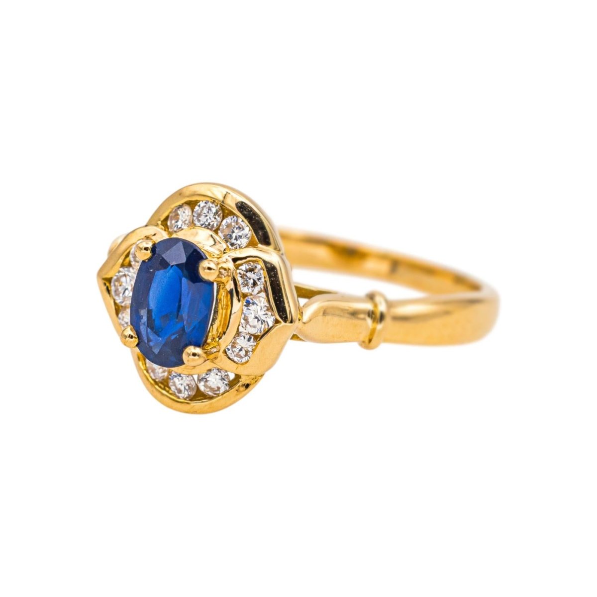 Bague Entourage en or jaune, saphir et diamants - Castafiore