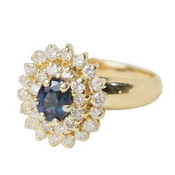 Bague Entourage en or jaune, saphir, et diamants - Castafiore