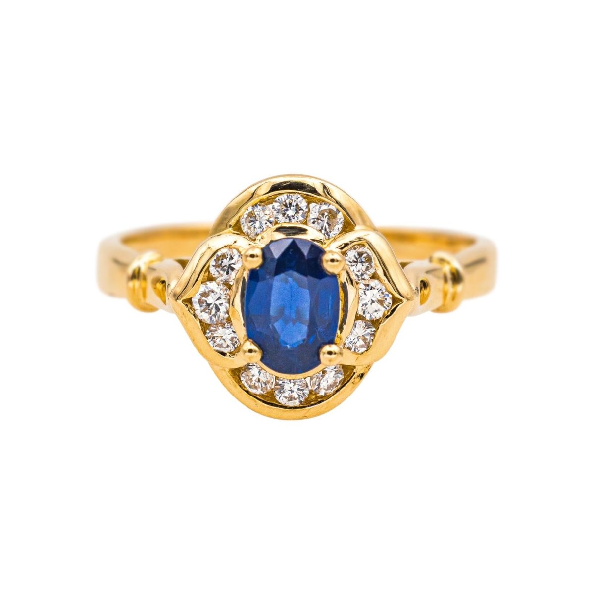 Bague Entourage en or jaune, saphir et diamants - Castafiore