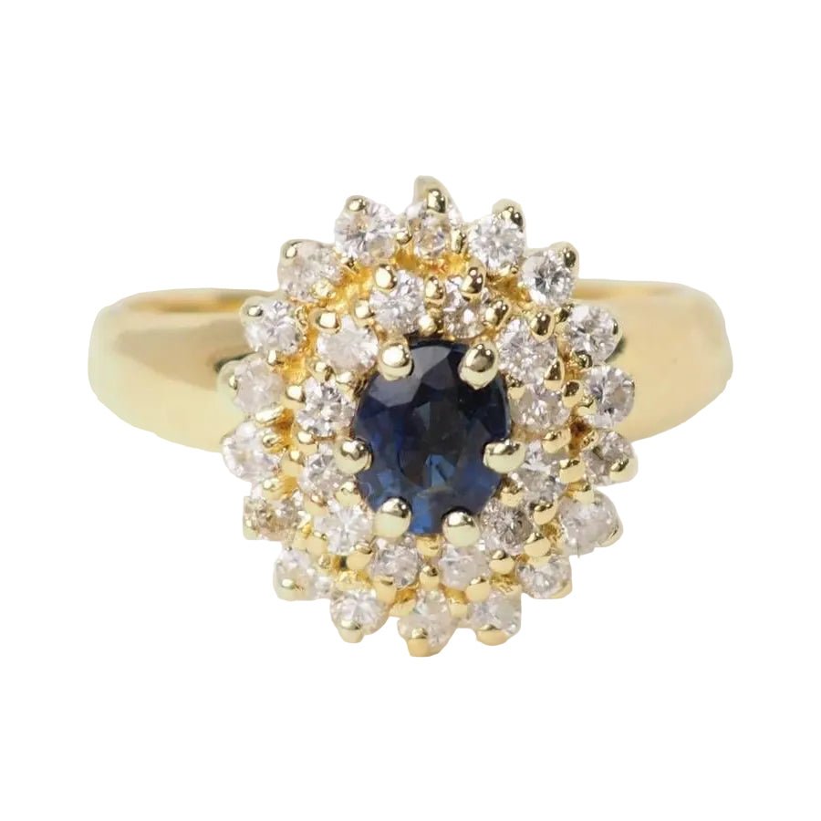 Bague Entourage en or jaune, saphir, et diamants - Castafiore