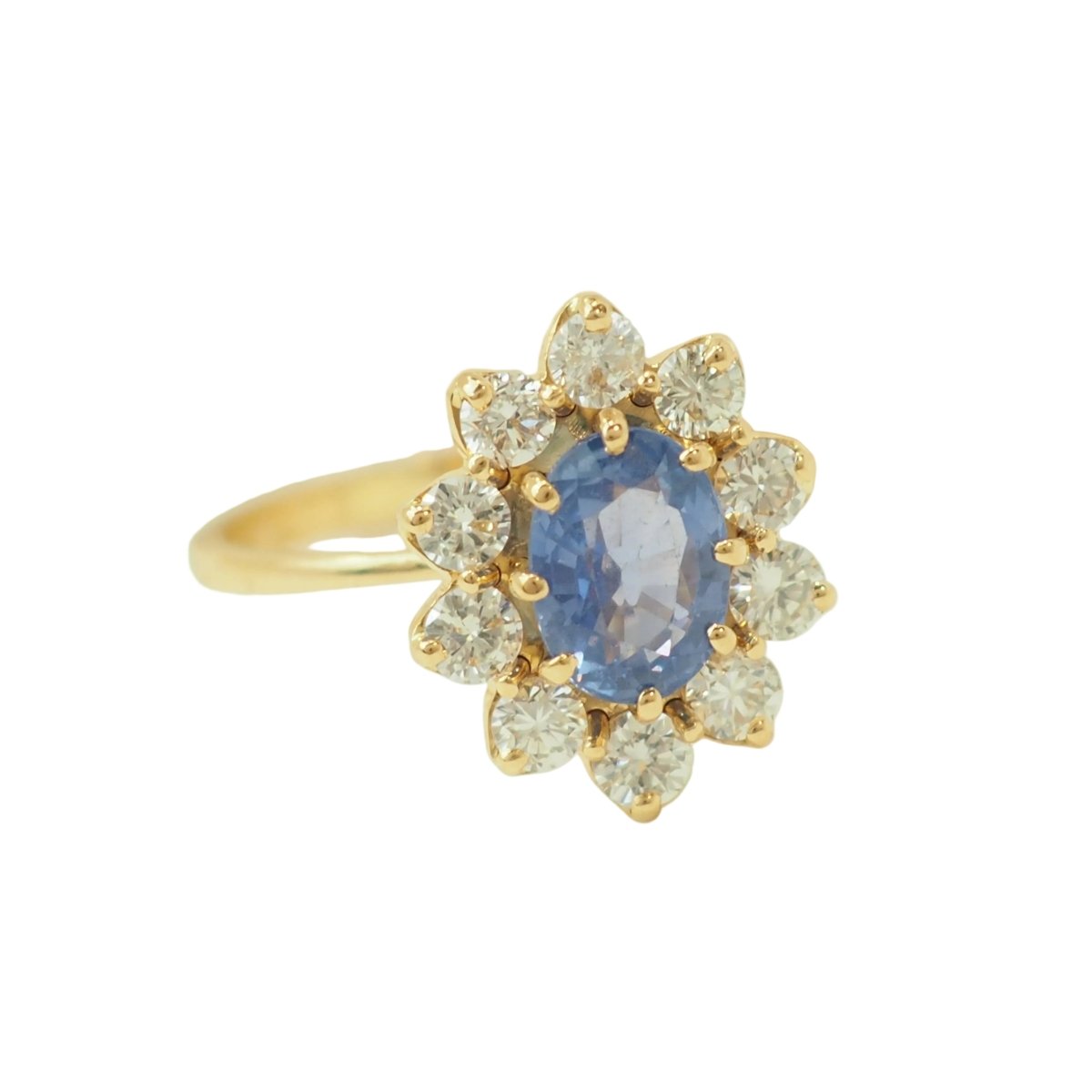 Bague Entourage en or jaune, saphir et diamants - Castafiore