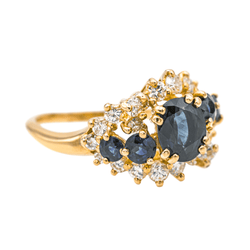 Bague Entourage en or jaune, saphirs et diamants - Castafiore
