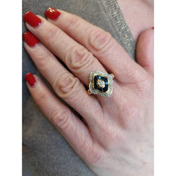 Bague Entourage en or jaune saphirs et diamants - Castafiore