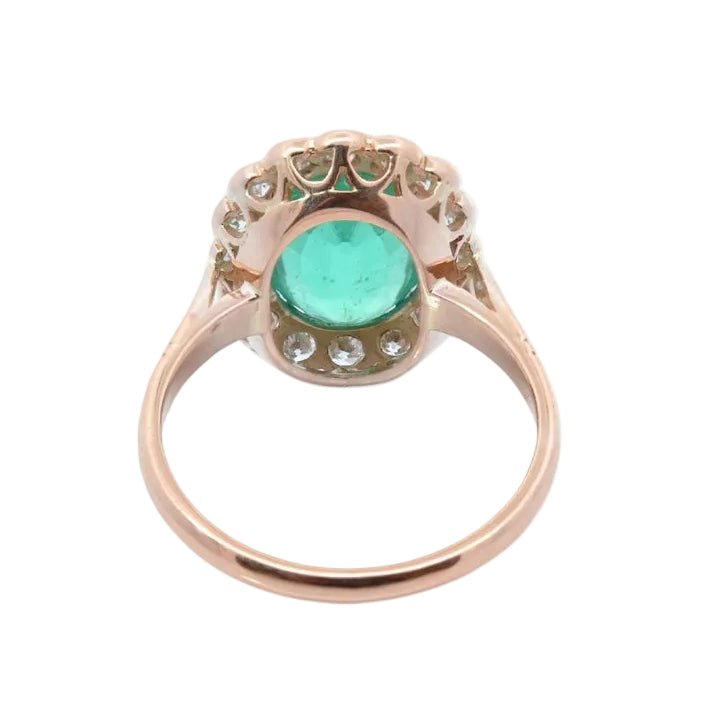 Bague Entourage en or rose, émeraude et diamants - Castafiore