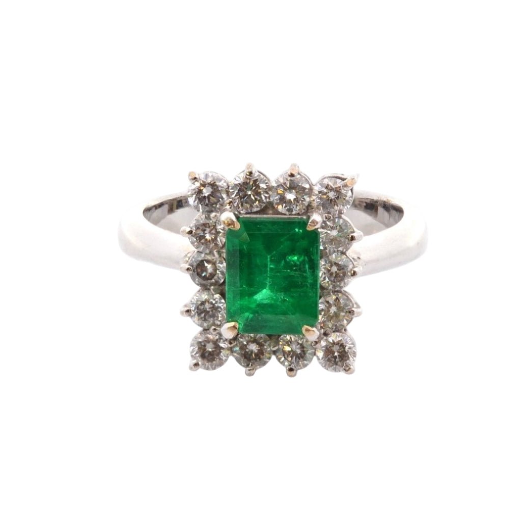 Bague Entourage en platine, émeraude, et diamants - Castafiore
