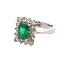 Bague Entourage en platine, émeraude, et diamants - Castafiore